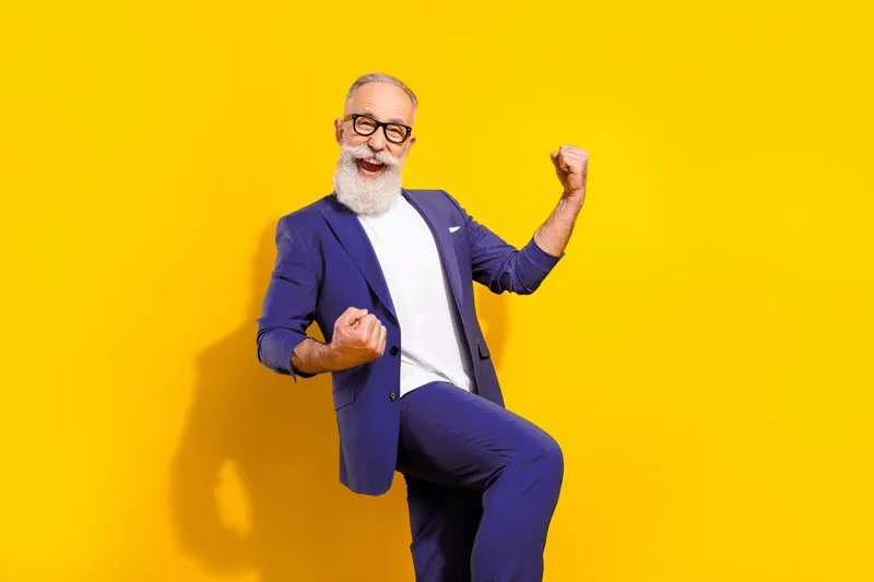 an old man wearing corporate clothing from Ignition Marketing