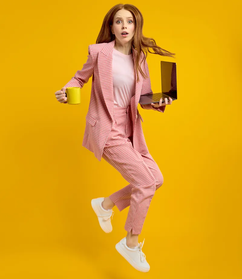 a woman wearing womens corporate suit from Ignition Marketing