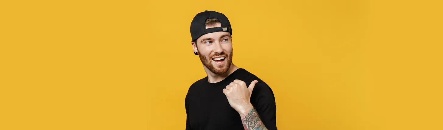 ma wearing Ignition's promotional headwear cap hero image desktop