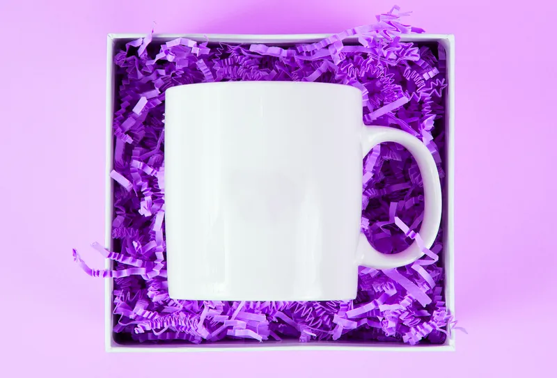 a mug in a gift box intended to be a custom corporate gift