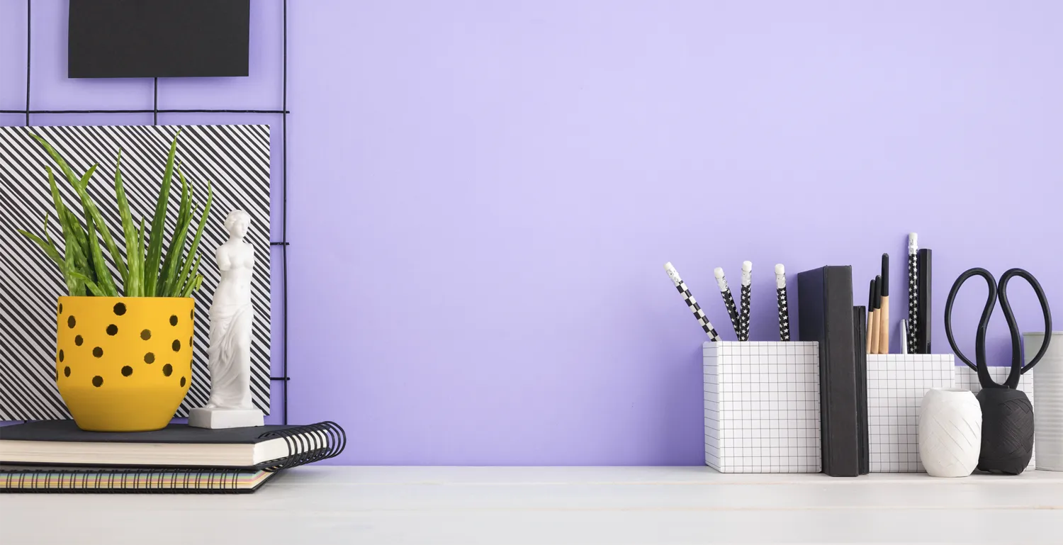 Branded stationery and personalized desk accessories arranged on a table