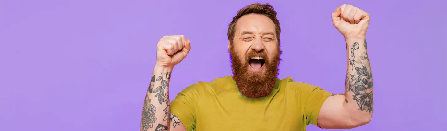 a man is happy about dispay banners hero image desktop